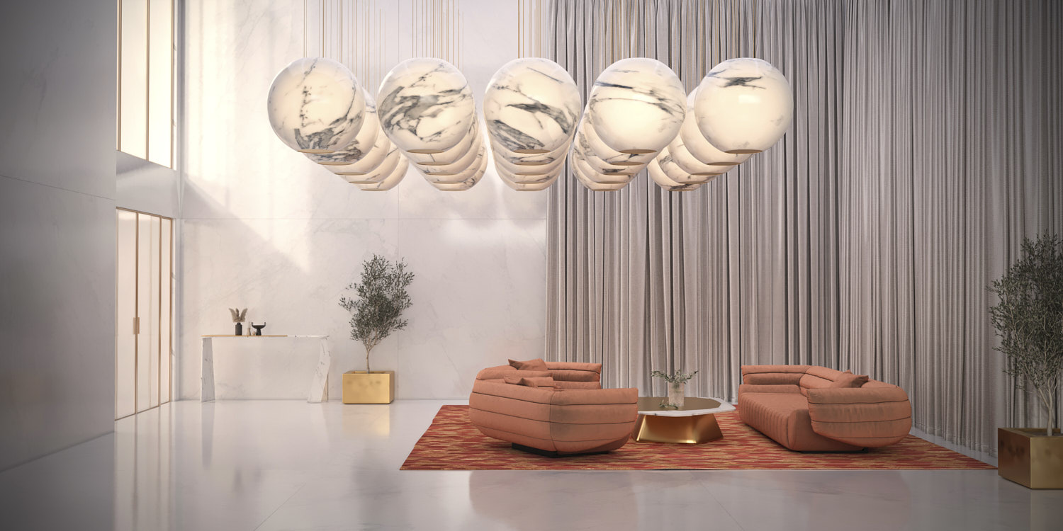 Carrara marble custom luminaire — spherical form with brass accents